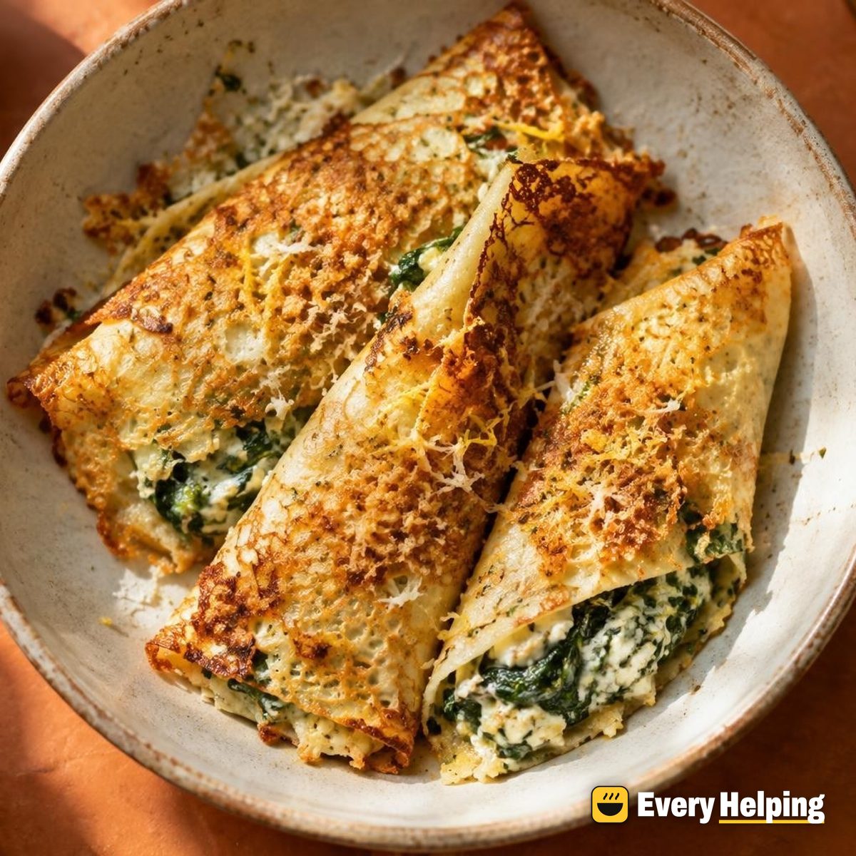 Lemony Spinach Ricotta Crêpes with Parmesan Crunch