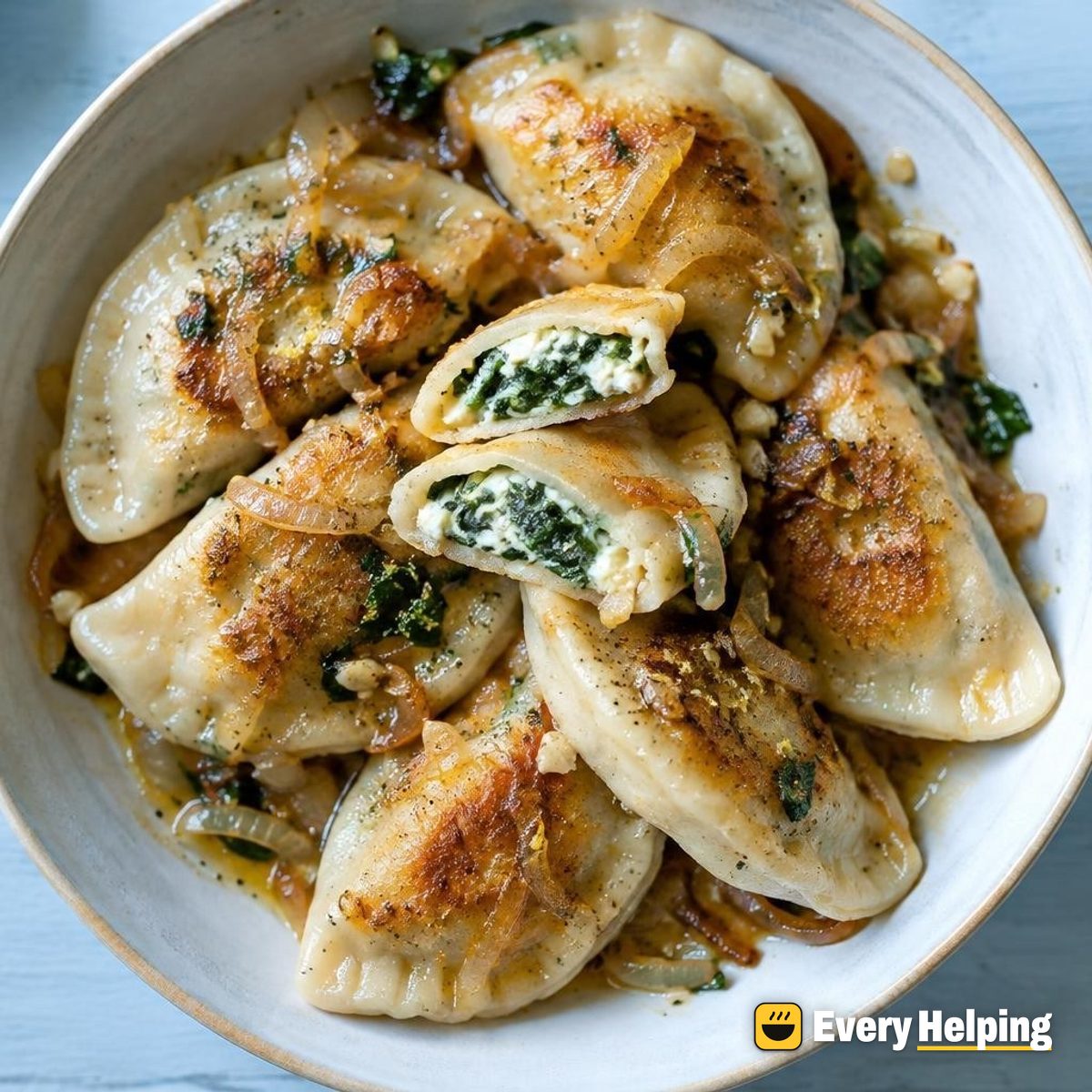 Pan-Crisped Spinach Mozzarella Pierogi, Garlic Onion Butter
