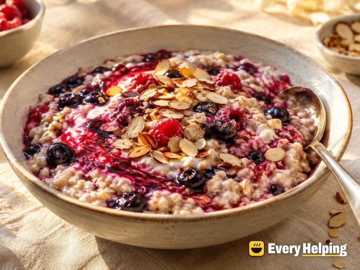 Warm Blueberry Vanilla Porridge with Raspberry Swirl
