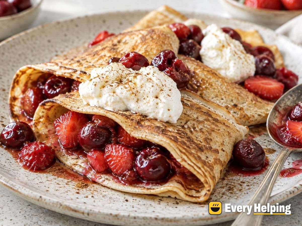 Cinnamon Crêpes with Warm Cherry-Strawberry Compote