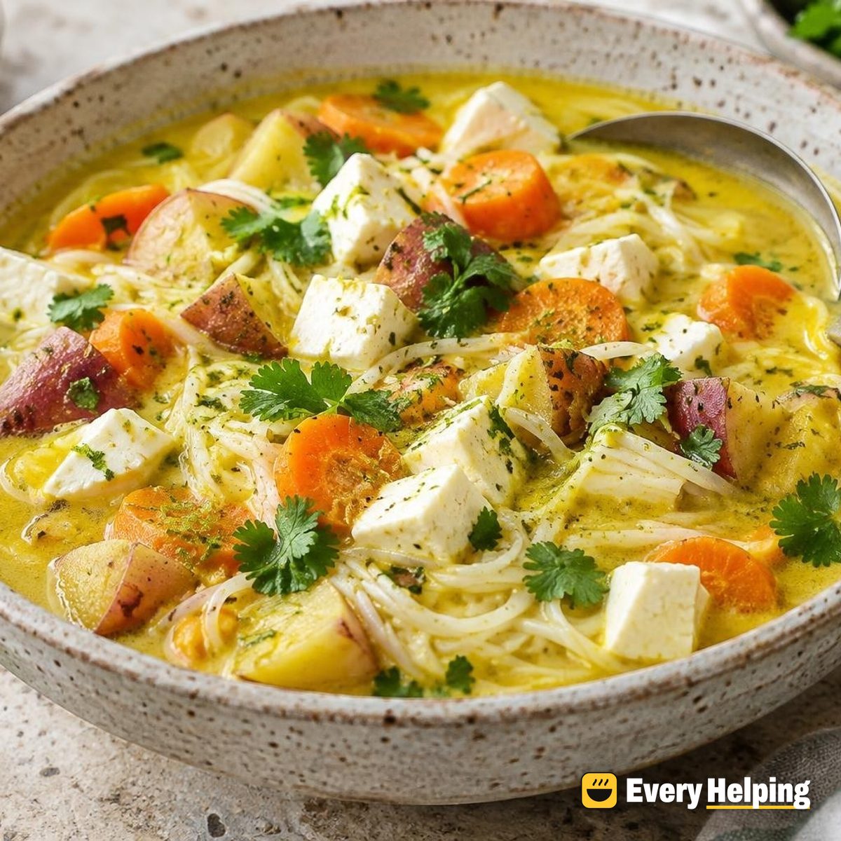 Golden Coconut Noodle Soup with Queso Fresco