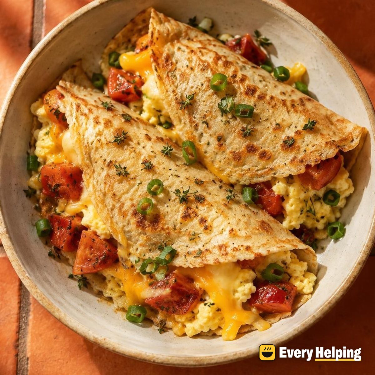 Oat Crêpes with Scrambled Eggs, Tomato and Cheddar